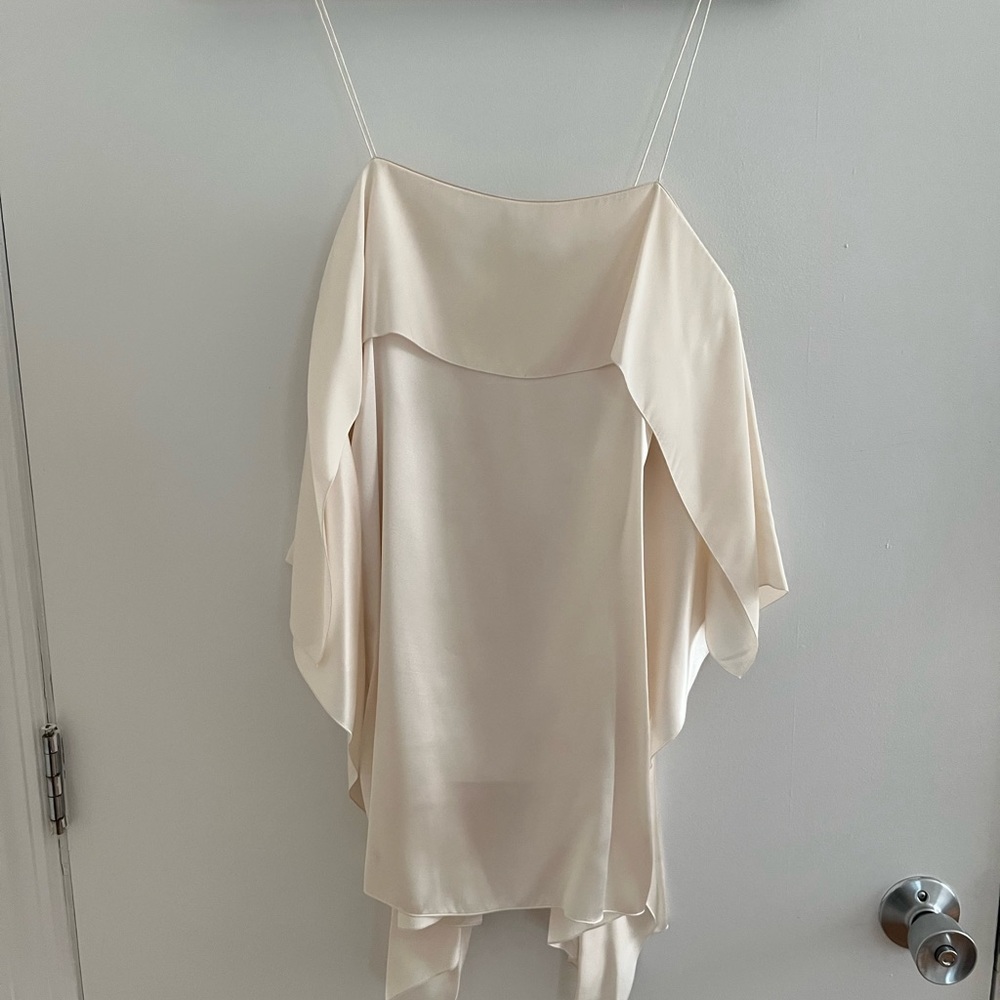 Barbara Bui silk top with spaghetti straps and side zipper.